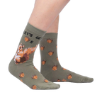 Lifestyle shot of 'Let's Get Nuts' socks on a person's legs, showing how the socks look when worn.