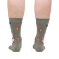 Rear view of a person wearing a pair of 'Let's Get Nuts' socks, showcasing the full back design of the socks.