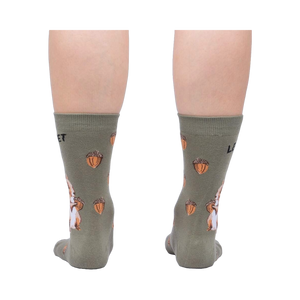 Rear view of a person wearing a pair of 'Let's Get Nuts' socks, showcasing the full back design of the socks.