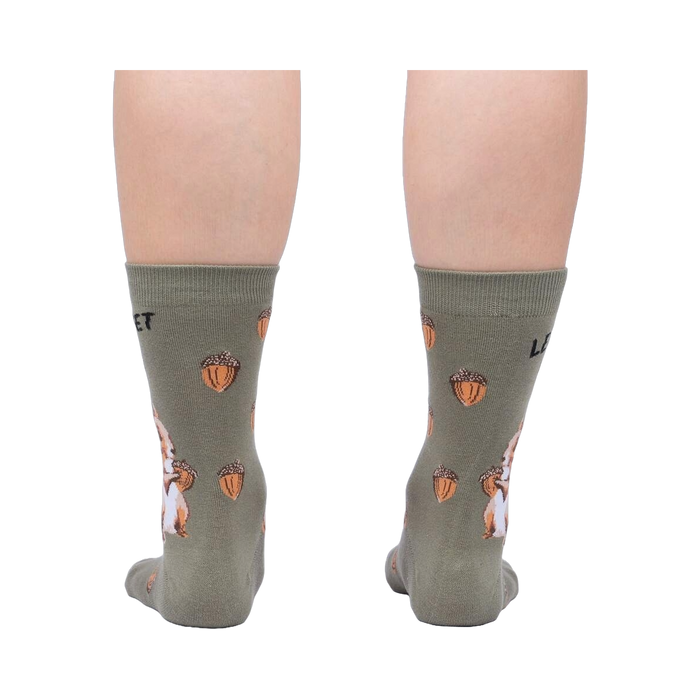 Rear view of a person wearing a pair of 'Let's Get Nuts' socks, showcasing the full back design of the socks.