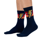 Lifestyle shot of male model wearing navy blue Thunderstruck socks.