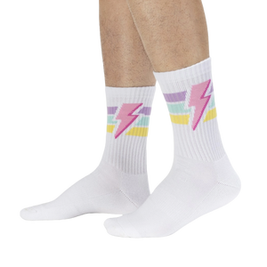 A pair of white socks with colorful stripes near the top and a lightning bolt on the outer ankle.