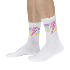 Lifestyle shot of male model wearing white Thunderstruck socks.