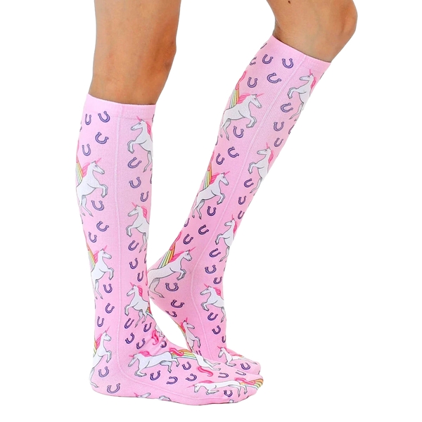 Lifestyle photo showcasing the pink unicorn socks on a person's legs, highlighting the sock's fit and pattern. [lf]