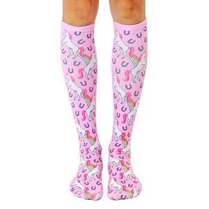 women's pink knee-high unicorn emoji socks with rainbows and horseshoes.   