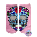 Pink ankle socks with a colorful sugar skull design. The skull's eye sockets are filled with silver glitter. [lf]