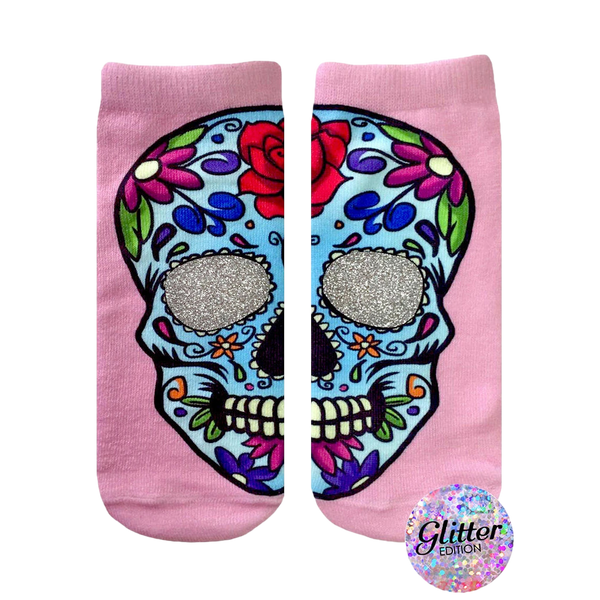 Pink ankle socks with a colorful sugar skull design. The skull's eye sockets are filled with silver glitter. [lf]