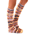 Lifestyle shot of Stacked Donut socks on a person's legs, showing the socks' length and design from a side angle. [lf]