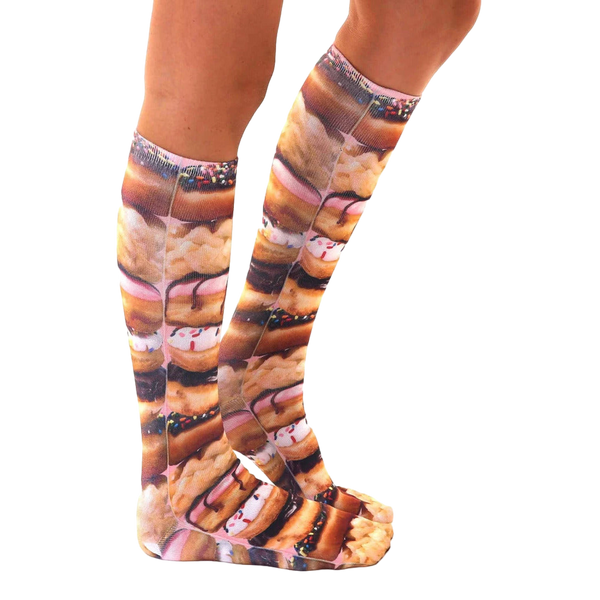Lifestyle shot of Stacked Donut socks on a person's legs, showing the socks' length and design from a side angle. [lf]