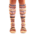 Pair of knee-high socks showcasing a stacked donut design.  Colors include browns, pinks, and sprinkles. [lf]