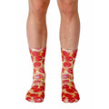 Pair of crew socks with a pepperoni pizza design.  Red, brown, and beige colors on a white background. [lf]