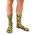 Another lifestyle shot of a person wearing the 'Caution' socks. Shows a different angle of the socks on the model's legs. [lf]