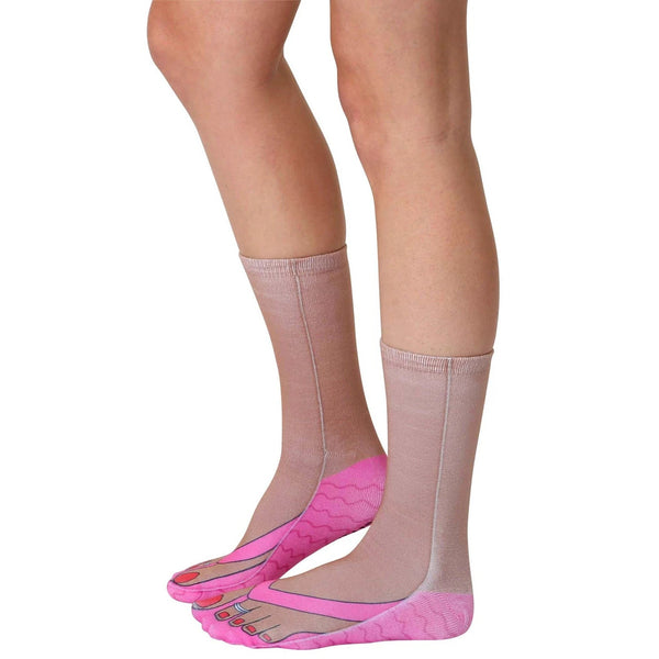 Lifestyle shot showcasing the Flip Flop Tan socks on a model's legs, highlighting the sock's fit and design. [lf]