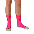 Lifestyle photo of legs wearing the watermelon socks. The socks are shown on a person's feet, and are slightly angled. [lf]