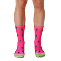Pair of crew socks with a vibrant watermelon slice print.  Red, pink, black, and green colors are featured. [lf]