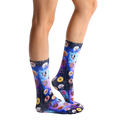 Lifestyle shot of Dog Cravings socks on a person's feet, showcasing the design and fit. [lf]
