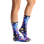 Lifestyle shot of Dog Cravings socks on a person's feet, showcasing the design and fit. [lf]