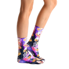 Lifestyle shot showcasing the socks on a person's legs, highlighting the vibrant colors and design details. [lf]