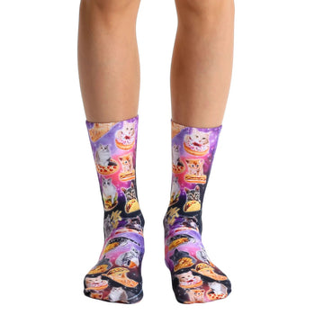 purple cat socks with a pattern of cats eating party food. available in men's and women's sizes.  