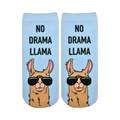 Pair of light blue ankle socks with a tan llama wearing sunglasses. Text reads, "No Drama Llama."