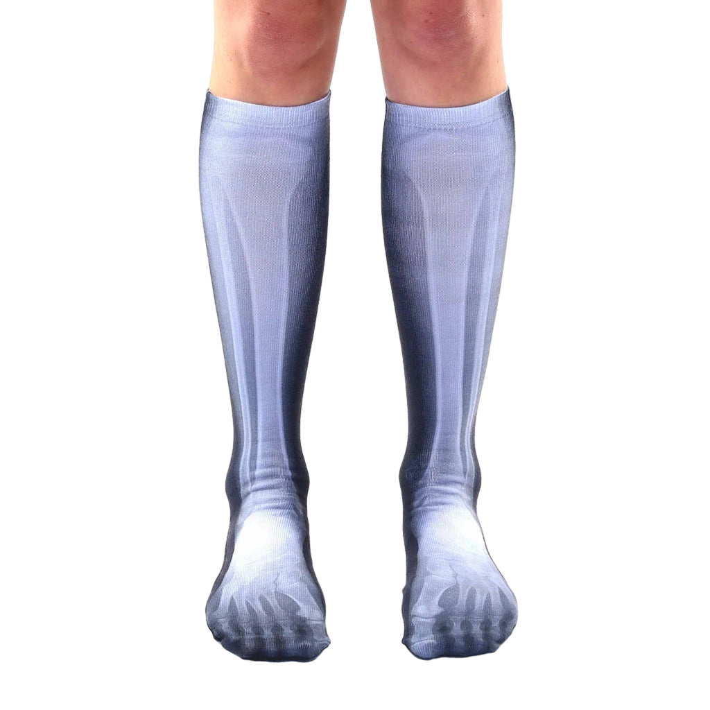 Pair of knee-high socks, grayscale, featuring a detailed X-ray image of leg bones.  Unique and fun! [lf]
