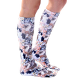 Lifestyle shot of a person wearing Kitty All Over knee-high socks, showcasing the fit and pattern. [lf]
