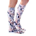 Lifestyle shot of a person wearing Kitty All Over knee-high socks, showcasing the fit and pattern. [lf]