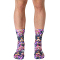 A pair of crew socks with a galaxy print featuring various breeds of dogs in a purple, pink, and black color scheme. [lf]