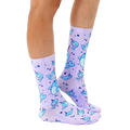 Lifestyle shot showing the narwhal socks on a person's legs, showcasing how they look when worn. [lf]