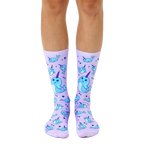 Lavender crew socks with a repeating pattern of light blue narwhals and bubbles. Fun and whimsical design. [lf]