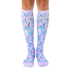 Pair of lavender knee-high socks with an all-over print of cute cartoon narwhals and bubbles. [lf]