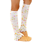 Lifestyle shot showing a person wearing the Rainbow Sprinkle Ice Cream knee-high socks. The socks are visible from the side. [lf]