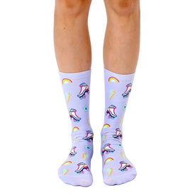 crew socks in lavender, featuring a pattern of rainbows, lightning bolts, stars, and roller skates. for men and women.   