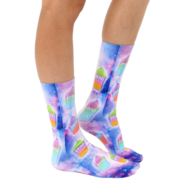 Lifestyle shot of model wearing the Slushie Universe socks; showing socks on feet, from the knees down. [lf]