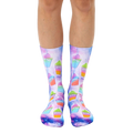 Pair of crew socks with a vibrant design of colorful slushies on a galaxy-print background. The slushies are pink, green, and orange. [lf]