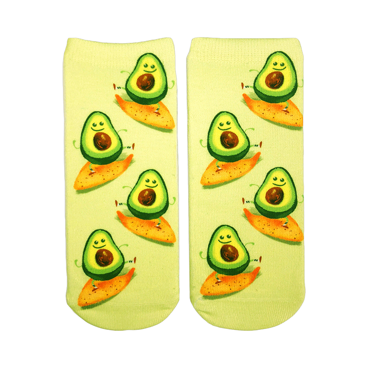 Pair of ankle socks on white background. Light green background with cartoon avocados riding orange tortilla chips. 