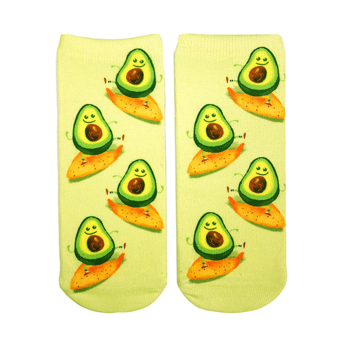 light green ankle socks with avocados surfing on orange surfboards.   }}