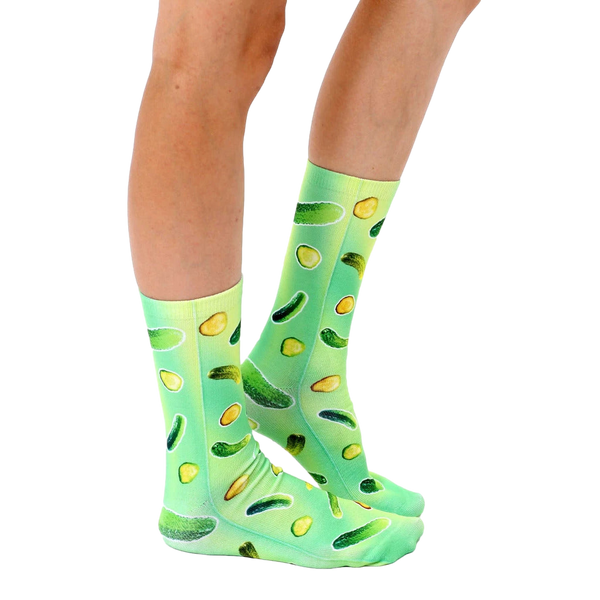 Lifestyle shot of model wearing Trippy Pickle socks. Shows how they look when worn. [lf]