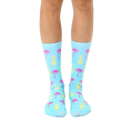 Pair of light blue crew socks with a fun, repeating pattern of pink palm trees and yellow pineapples.