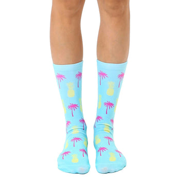   blue crew socks featuring pink palm trees and yellow pineapples: perfect for men and women who love summer.  