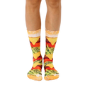 A pair of crew socks with a realistic burger print.  The main colors are yellow, red, green, and brown. [lf]