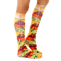 Lifestyle shot showing the knee-high burger socks on a person's legs, emphasizing the sock's length and design. [lf]