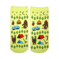 A pair of lime green ankle socks with a fun camping design. The pattern includes Bigfoot, a camper, tent, trees, and stars.