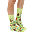 Lifestyle photo: A person's legs wearing the Bigfoot camping socks, showcasing the sock's design and fit. [lf]