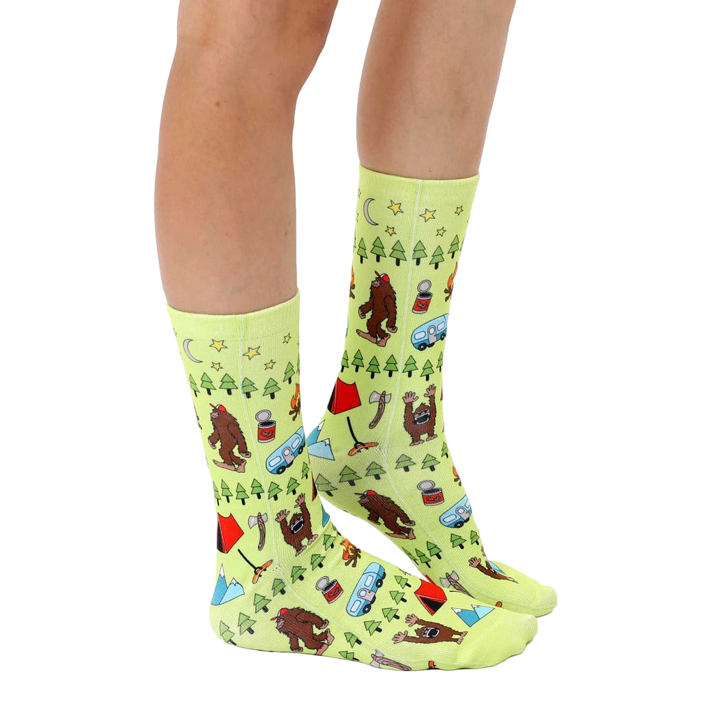 Lifestyle photo: A person's legs wearing the Bigfoot camping socks, showcasing the sock's design and fit. [lf]