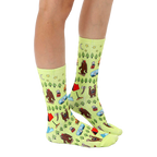Lifestyle photo: A person's legs wearing the Bigfoot camping socks, showcasing the sock's design and fit. [lf]