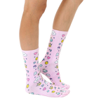 Lifestyle shot showing the socks on a person's legs from the side, showcasing how the socks look when worn. [lf]