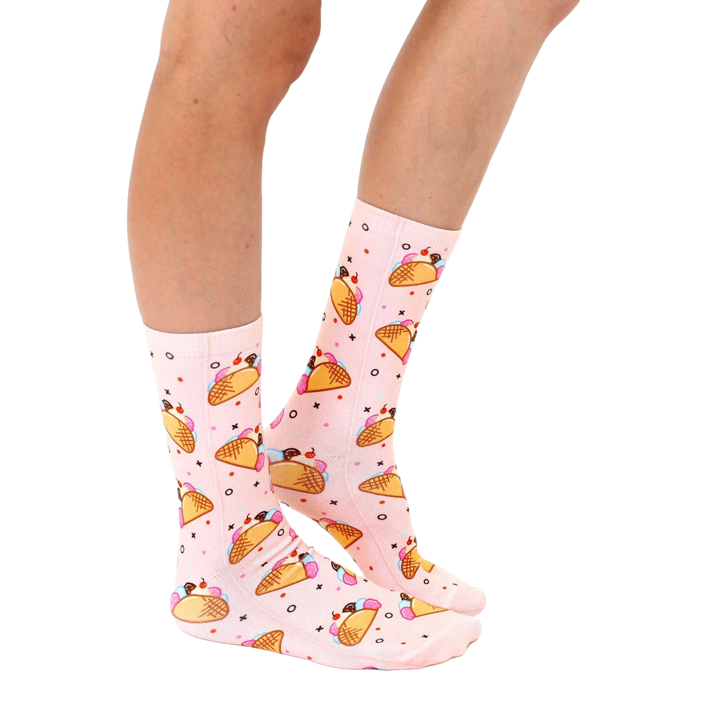 Lifestyle shot showcasing the Ice Cream Taco socks on a person's feet, showing how the socks look when worn. [lf]