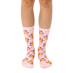 Pair of pink crew socks with a whimsical all-over print of ice cream tacos.  Features pink, brown, and pastel accents. [lf]