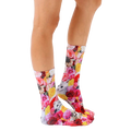 Lifestyle shot showcasing Kitty Garden crew socks on a model's legs, highlighting the sock's vibrant print and fit. [lf]